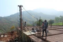 निर्माणाधिन भवन अनुमगन