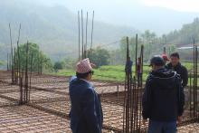 निर्माणाधिन भवन अनुमगन